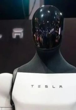 Tesla reduces electric car production, focuses on robots