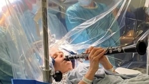 Woman Playing Clarinet with Parkinson's Disease Surgery