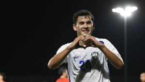 Young footballers amazed by scoring a goal on their debut