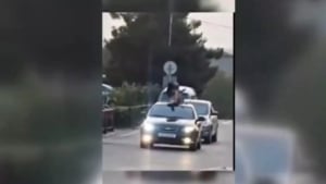 Namanganda qiz avtomobil ustida xavfli harakat qildi