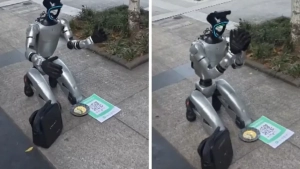 Xitoyda gumanoid robot ko‘chada odamlardan pul so‘radi