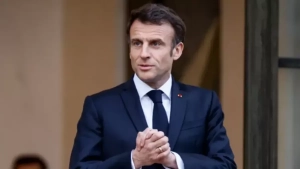Macron remains in office, political crisis continues