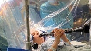 Woman Playing Clarinet with Parkinson's Disease Surgery
