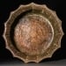 Lead container in the shape of a flower petal returned to Uzbekistan