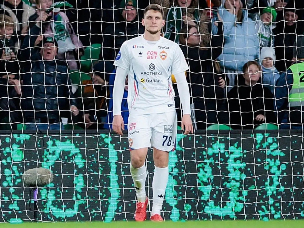 Igor Diveev as a child posing with German stars